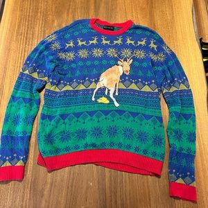 Ugly holiday sweater with pooping rain deer